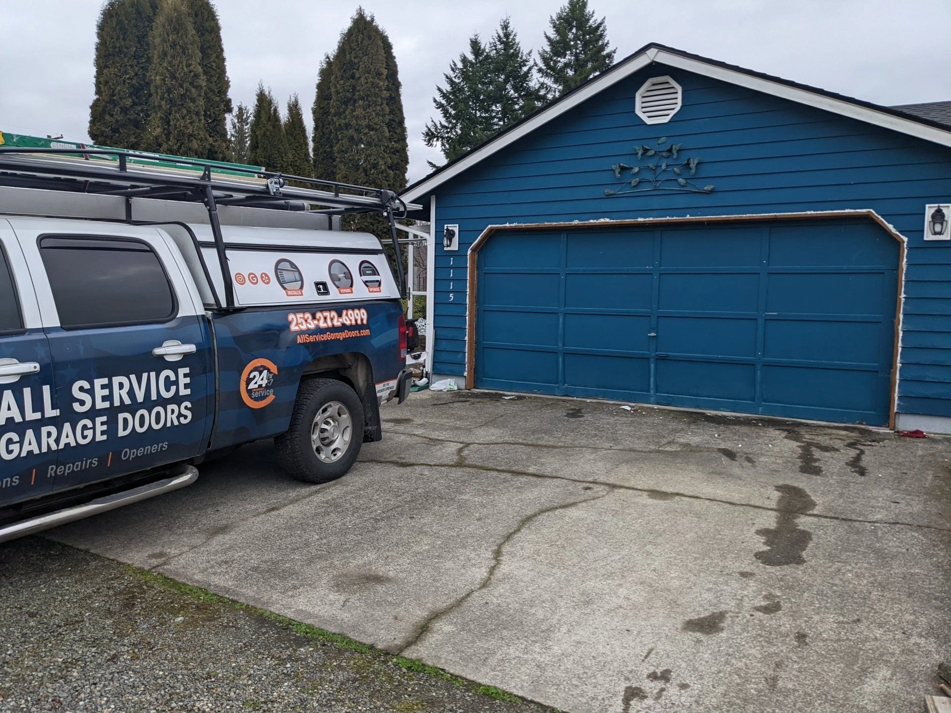 Garage door service vehicle parked outside