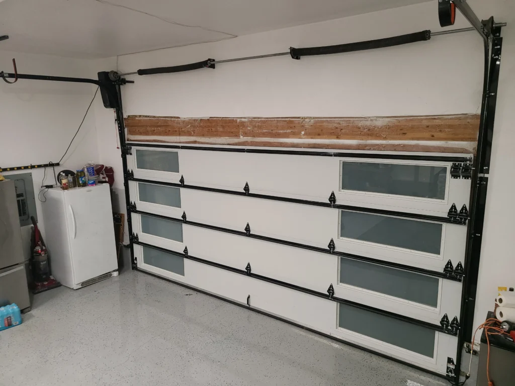 Clean garage with new door installed