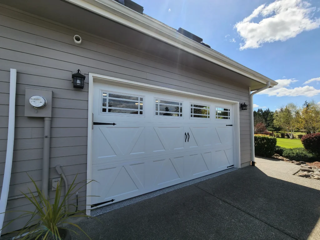 White garage door with decorative windows