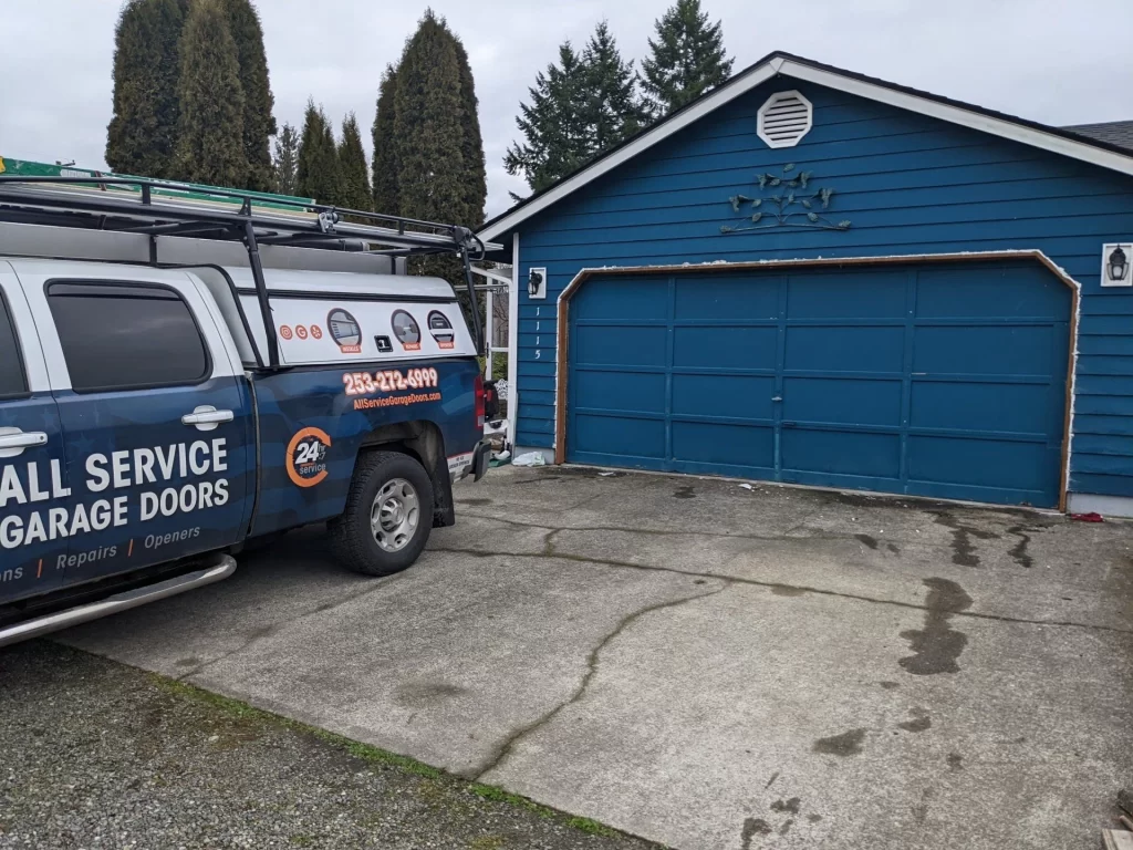 Garage door service vehicle parked outside