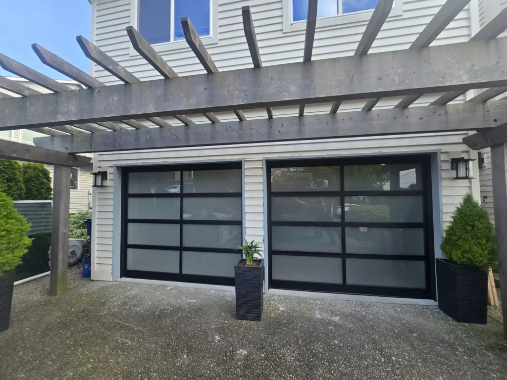 Modern garage doors with pergola overhead